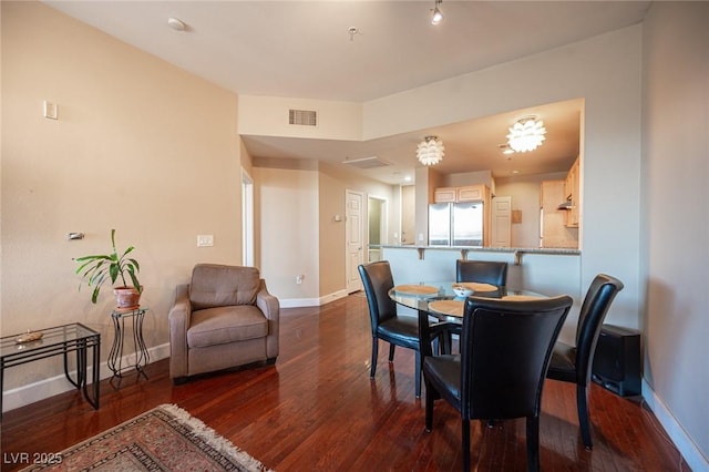 dining room featuring dark hardwood / wood-style floors