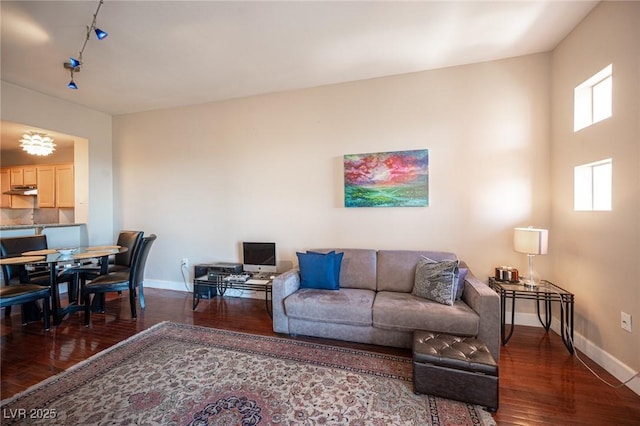 living room featuring dark hardwood / wood-style flooring