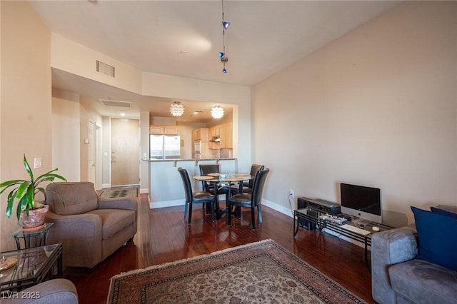 living room featuring dark hardwood / wood-style floors