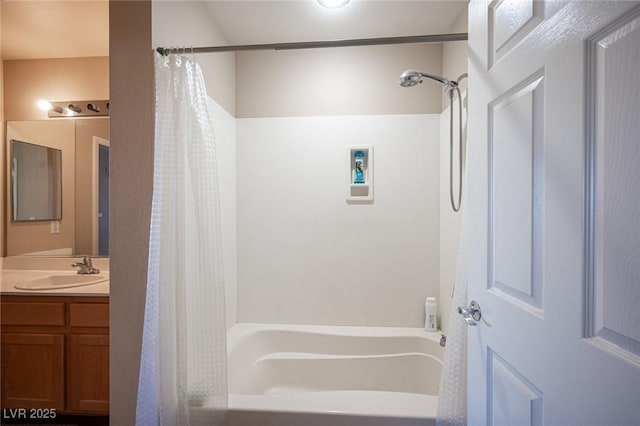 bathroom with shower / bath combo and vanity