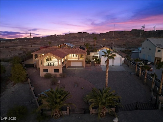 aerial view at dusk with a mountain view