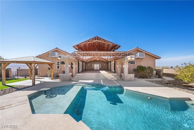 view of pool featuring a gazebo and a patio