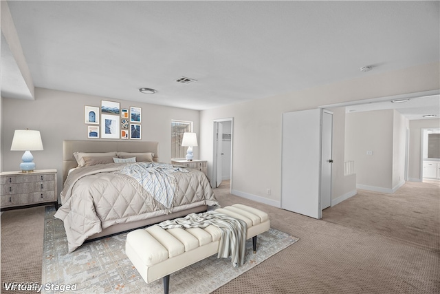 bedroom with light carpet