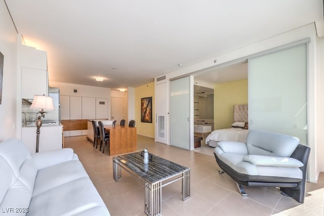 living room featuring light tile patterned floors