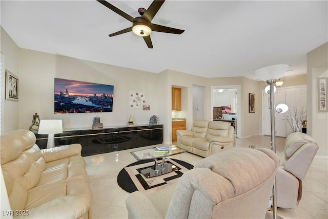 tiled living room featuring ceiling fan