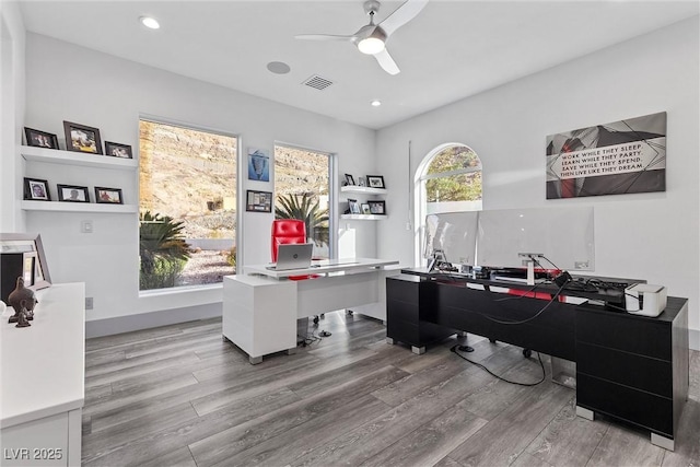 office with ceiling fan and wood-type flooring