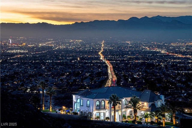 aerial view at dusk with a mountain view