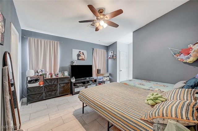 bedroom featuring ceiling fan