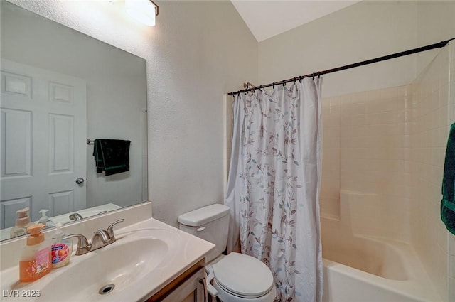 full bathroom featuring shower / tub combo with curtain, vanity, and toilet