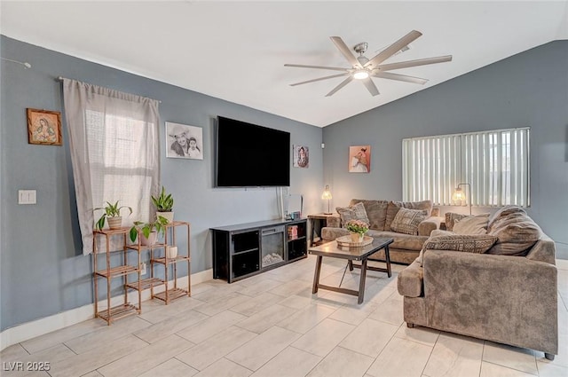 living room with vaulted ceiling and ceiling fan