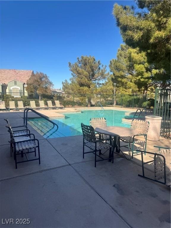 view of pool with a patio