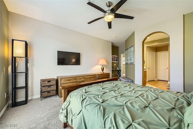 bedroom featuring ceiling fan and light colored carpet