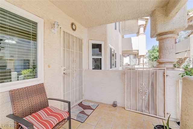 view of patio / terrace with a balcony