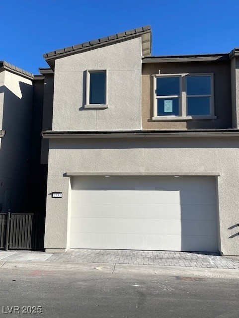 view of front of property featuring a garage