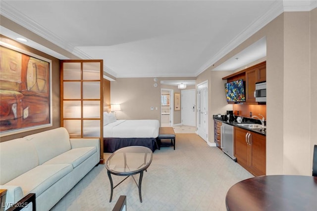 living room with crown molding and sink