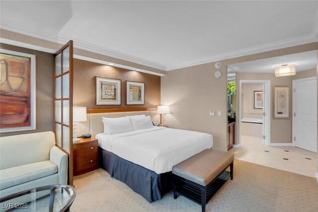 bedroom with ensuite bath and ornamental molding