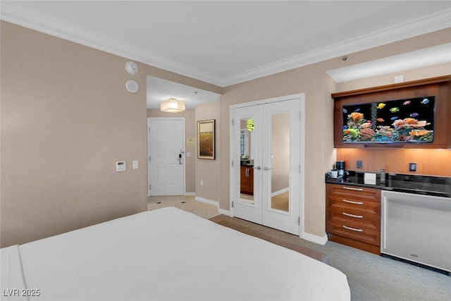 bedroom featuring ornamental molding and french doors