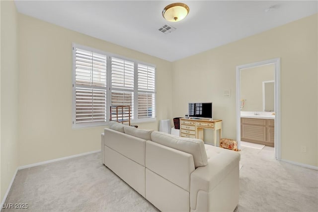 living room featuring light carpet