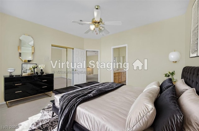 bedroom featuring connected bathroom, a closet, ceiling fan, and carpet flooring