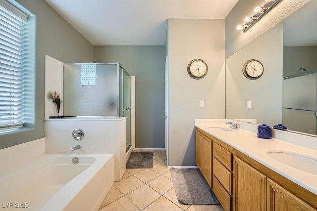 bathroom featuring vanity, tile patterned flooring, and plus walk in shower