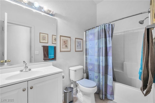 full bathroom featuring toilet, vanity, and shower / bathtub combination with curtain