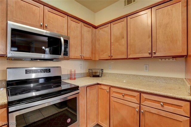 kitchen with appliances with stainless steel finishes