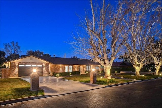 single story home with a garage and a front yard