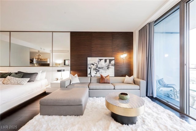 living room featuring hardwood / wood-style flooring and a wealth of natural light