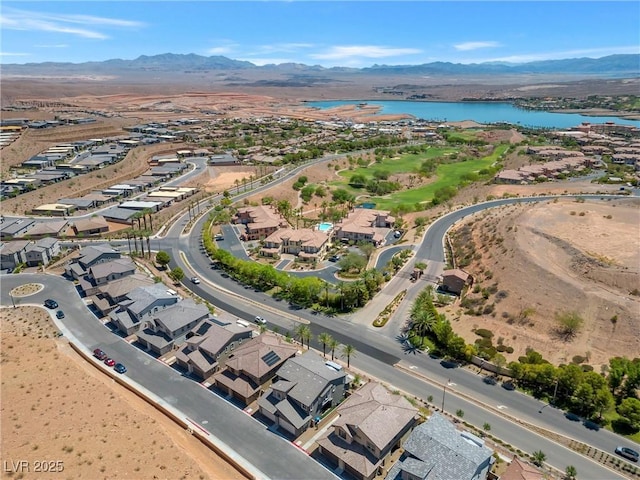 bird's eye view featuring a water and mountain view