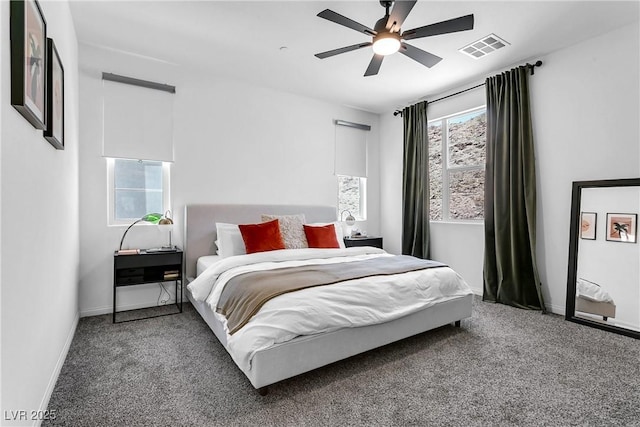 bedroom with ceiling fan and carpet