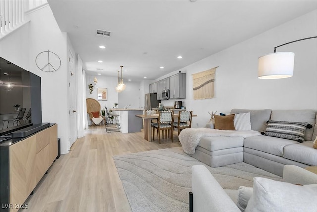 living room featuring light hardwood / wood-style flooring