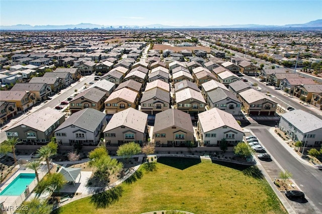 drone / aerial view featuring a mountain view