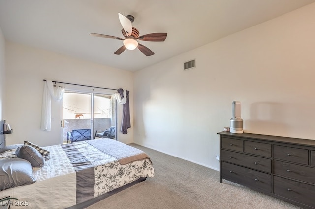 bedroom featuring ceiling fan, access to exterior, and light carpet