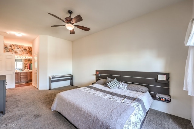 carpeted bedroom featuring ceiling fan and connected bathroom