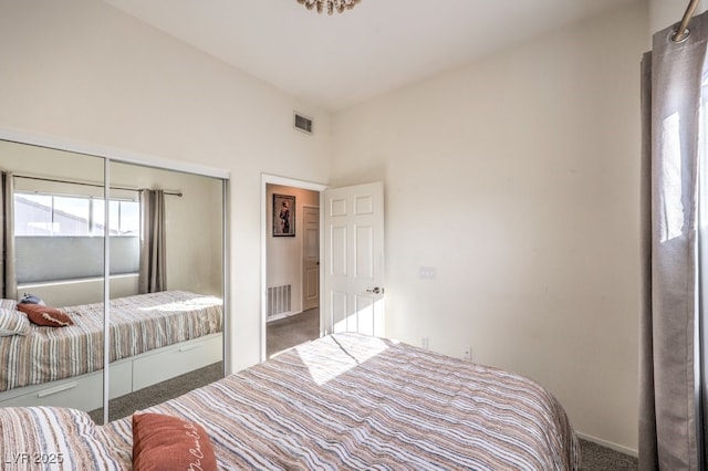 carpeted bedroom with a closet