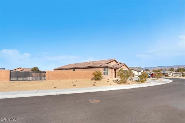 view of front of house with a mountain view