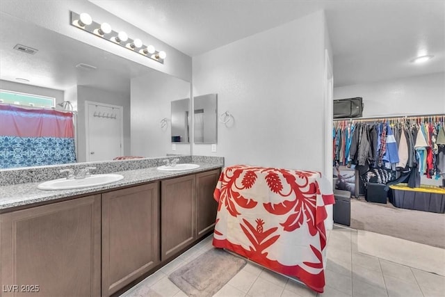 bathroom featuring vanity and tile patterned floors