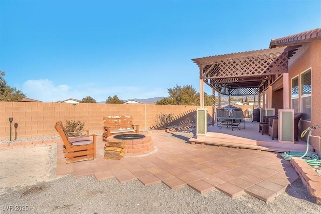 view of patio featuring a fire pit