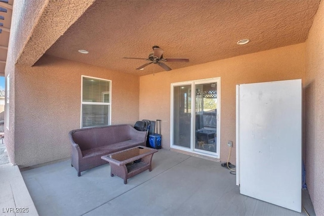 view of patio with ceiling fan