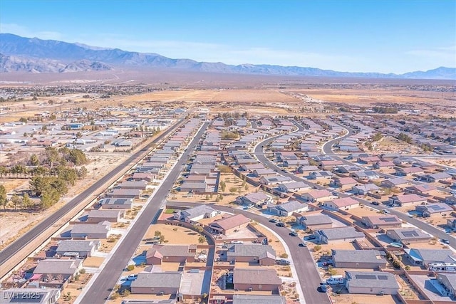 drone / aerial view featuring a mountain view