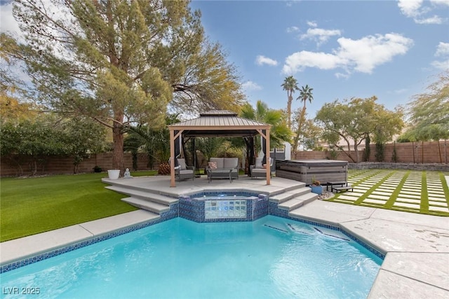 view of swimming pool with an in ground hot tub, a yard, a gazebo, and a patio