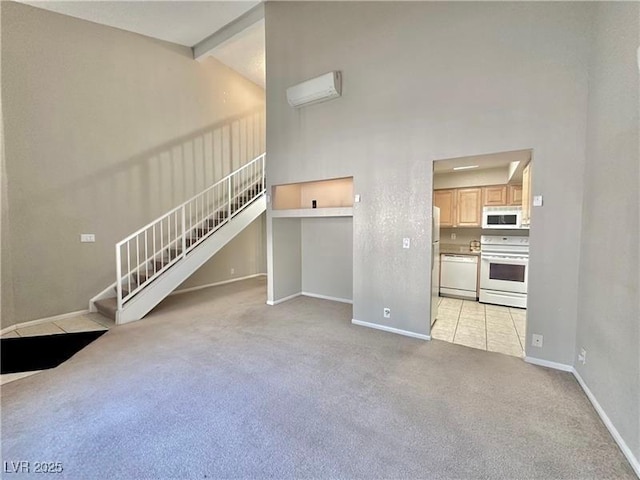 unfurnished living room featuring light carpet and a wall mounted air conditioner