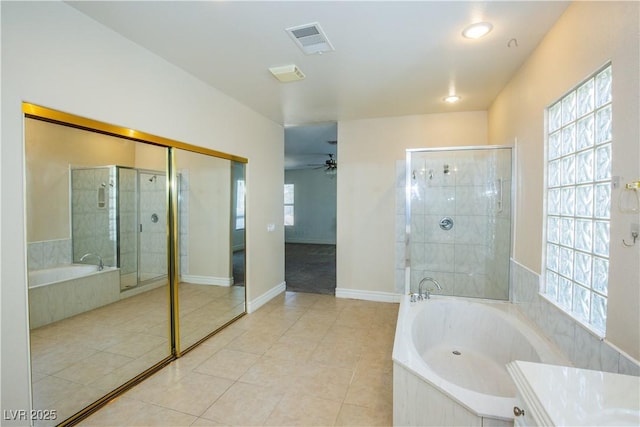 bathroom with vanity, ceiling fan, independent shower and bath, and tile patterned floors