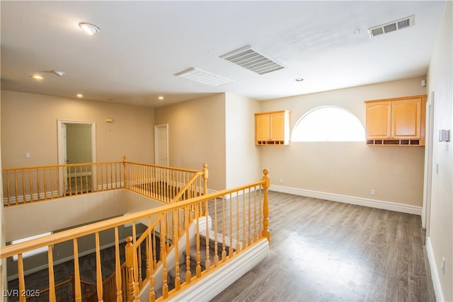 hall featuring wood-type flooring