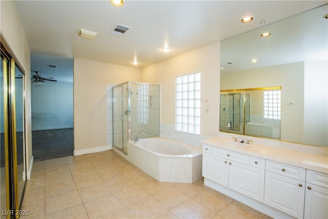 bathroom with vanity, independent shower and bath, and tile patterned flooring