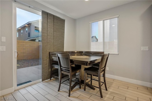 dining room with light wood-type flooring