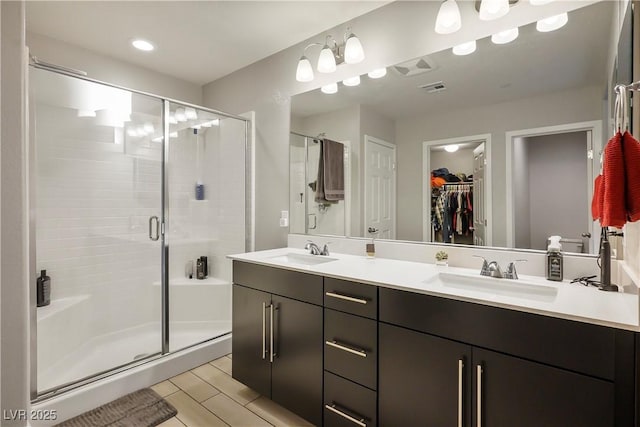 bathroom with vanity and walk in shower