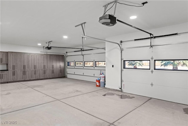 garage featuring a garage door opener