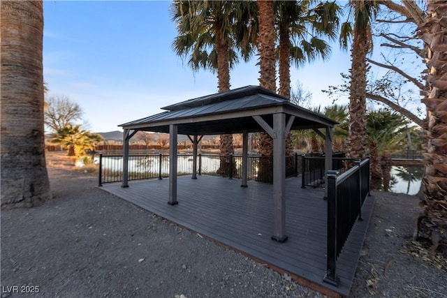 view of patio / terrace featuring a gazebo and a water view