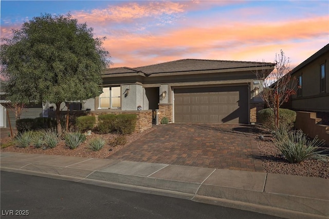 view of front of home with a garage